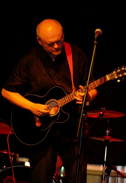 Conny on acoustic guitar