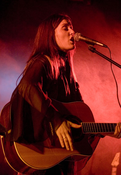 Anne-Marie playing guitar