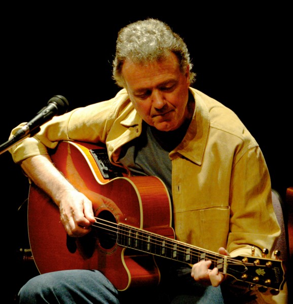 Brian on acoustic guitar