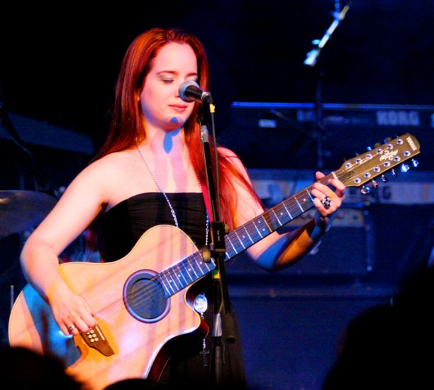 Fernanda playing guitar