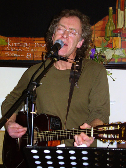 Dany on harmonica and guitar