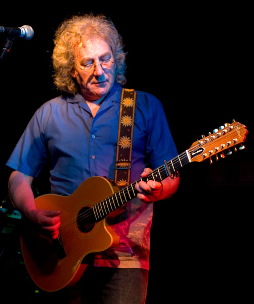 Chas playing 12-string acoustic guitar